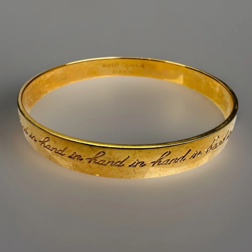 Kate Spade “Hand and Hand” inscribed Goldtone Bangle Bracelet - Picture 10 of 15